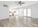 Open floor plan showcasing the kitchen and adjacent living room with bright white paint at 7416 Quail Ridge Dr, Charlotte, NC 28226