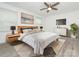 Cozy main bedroom featuring modern decor, soft lighting, and plush bedding at 7416 Quail Ridge Dr, Charlotte, NC 28226