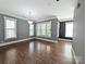 Bright living room with hardwood floors, ample natural light, and neutral paint at 751 Terrace Park, Rock Hill, SC 29730
