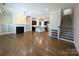 Open-concept living room and kitchen with hardwood floors and plenty of natural light at 751 Terrace Park, Rock Hill, SC 29730