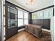 Office space featuring an executive desk, wainscoting, and plenty of natural light at 751 Terrace Park, Rock Hill, SC 29730