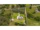 An aerial view of the home, highlighting the property lines at 8993 Plank Rd, Norwood, NC 28128