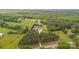 A beautiful aerial view showcasing the home and surrounding landscape at 8993 Plank Rd, Norwood, NC 28128