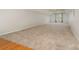 Large bonus room featuring neutral walls and plush carpeting and a sunny window at 8993 Plank Rd, Norwood, NC 28128
