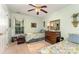 Inviting bedroom featuring twin beds, a ceiling fan, and natural light at 9011 Brad Ct, Matthews, NC 28104