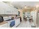 Sun-drenched kitchen featuring a cozy breakfast nook and modern appliances at 9011 Brad Ct, Matthews, NC 28104