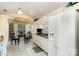 Bright eat-in kitchen with a breakfast table in front of a window at 9011 Brad Ct, Matthews, NC 28104