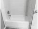 Clean bathroom with a white tiled bathtub at 102 Central Ave, Bessemer City, NC 28016
