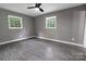Bedroom with hardwood floors and natural light at 102 Central Ave, Bessemer City, NC 28016