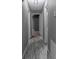 Hallway featuring hardwood floors and neutral paint at 102 Central Ave, Bessemer City, NC 28016
