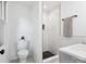 Stylish bathroom showcases marble tile, black accents, and a glass-enclosed shower at 10728 Forest Dr, Matthews, NC 28105