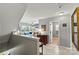 Bright upstairs hallway that flows into a sitting room with natural light at 112 E Heart Pine Ln, Statesville, NC 28677
