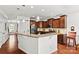 Spacious kitchen featuring granite countertops, stainless steel appliances, and pendant lighting at 112 E Heart Pine Ln, Statesville, NC 28677