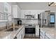 Well-equipped kitchen with stainless steel appliances, granite countertops, and ample cabinet space at 11834 Planters Estates Dr, Charlotte, NC 28278