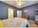 Inviting bedroom showcases natural light, a dresser, and easy access to the en-suite bathroom at 120 Prairie View Ct, Belmont, NC 28012