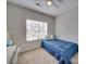 Bedroom with blue bedspread, neutral carpet and a window at 120 Prairie View Ct, Belmont, NC 28012