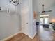 Bright entryway with hardwood floors, coat hooks, and seamless access to the living area at 120 Prairie View Ct, Belmont, NC 28012