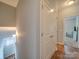 Upstairs hallway with hardwood floors and white doors at 120 Prairie View Ct, Belmont, NC 28012