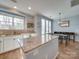 Modern kitchen with stainless appliances, granite counters, ample counter space, and natural light at 120 Prairie View Ct, Belmont, NC 28012