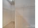 Walk-in closet featuring white walls, neutral carpet, and wire shelving at 120 Prairie View Ct, Belmont, NC 28012