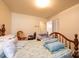 Comfortable bedroom featuring a queen bed, neutral walls, and carpet, perfect for relaxation at 1211 25Th Se St, Hickory, NC 28602