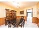 Traditional dining room with wood table, chairs, china cabinet, and chandelier for Gathering dinners at 1211 25Th Se St, Hickory, NC 28602