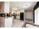 Bright kitchen featuring white cabinetry, granite countertops, and stainless steel appliances at 1211 25Th Se St, Hickory, NC 28602
