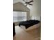 Bedroom with a large window, ceiling fan, and neutral carpet at 13116 Erwin Rd, Charlotte, NC 28273