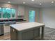Spacious kitchen with a large center island, stainless steel appliances, and stylish countertops at 138 Zircon Dr, Statesville, NC 28625