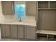 Mudroom featuring updated cabinets, light countertops, and built-in storage at 138 Zircon Dr, Statesville, NC 28625