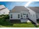 The backyard features a patio and green lawn at 1498 Burrell Nw Ave, Concord, NC 28027