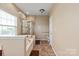 Well-lit bathroom includes a soaking tub, walk-in shower, and modern fixtures at 1498 Burrell Nw Ave, Concord, NC 28027