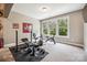 This home exercise room features plenty of natural light at 16547 Bastille Dr, Charlotte, NC 28278