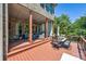 Spacious outdoor deck offering room to relax and entertain, adjacent to lush backyard at 16547 Bastille Dr, Charlotte, NC 28278