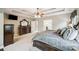 Bright main bedroom showcasing dark wood furniture, a large mirror, and neutral carpet at 16547 Bastille Dr, Charlotte, NC 28278