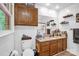 Well-lit bathroom features a vanity with storage cabinets at 169 Primrose Ln, Statesville, NC 28625