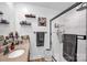 Updated bathroom featuring a shower, vanity, and modern fixtures at 169 Primrose Ln, Statesville, NC 28625