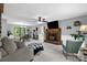 Inviting living room with cozy fireplace, and slider to the outdoor deck at 169 Primrose Ln, Statesville, NC 28625