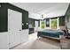 Bright main bedroom with a ceiling fan and a view of the backyard at 169 Primrose Ln, Statesville, NC 28625