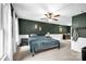 Spacious main bedroom features a ceiling fan, and white molding at 169 Primrose Ln, Statesville, NC 28625