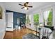 Office featuring wood floors, ample natural light, and access to an outdoor deck at 169 Primrose Ln, Statesville, NC 28625
