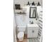 Bright bathroom with white shiplap, modern vanity, updated lighting, and decorative accents at 1699 Riverdale Dr, Rock Hill, SC 29732