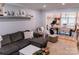 Bright living room showcasing a cozy sectional, exercise bike, and a view into the dining area at 1699 Riverdale Dr, Rock Hill, SC 29732