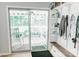 Bright mudroom view from sliding door, showcasing built-ins and seamless indoor-outdoor transition at 1699 Riverdale Dr, Rock Hill, SC 29732