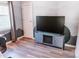Modern office space with sleek shelving, a unique painted wall design, and wood-look flooring at 1699 Riverdale Dr, Rock Hill, SC 29732