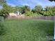 Sprawling backyard featuring a high wooden fence and a lush lawn at 1714 Maribel Ave, Charlotte, NC 28216