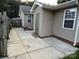 The house and backyard featuring concrete patio area and vinyl siding at 1714 Maribel Ave, Charlotte, NC 28216