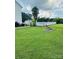 Large backyard featuring an in-ground pool, fire pit, and ample green space, perfect for outdoor enjoyment at 212 Countryside Rd, Kings Mountain, NC 28086