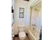 Cozy bathroom with tub and shower combo, toilet and features classic fixtures and finishes at 212 Countryside Rd, Kings Mountain, NC 28086