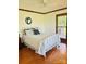 Bright bedroom with large window, plush bedding, and calming decor, ideal for rest and relaxation at 212 Countryside Rd, Kings Mountain, NC 28086